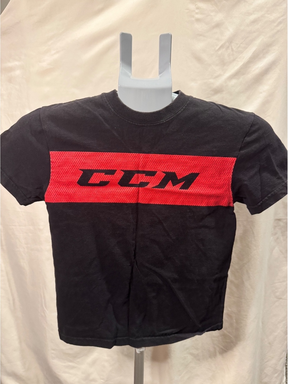 Youth CCM Black Cotton T-Shirt with Bold Red Logo Stripe Size S